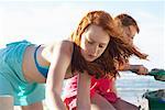 Girls Making Sandcastles