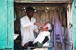 Man Getting a Shave and Haircut, Madhya Pradesh, India