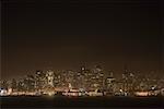 Illuminated buildings at waterfront, California, USA