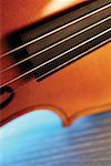 Close-up of violin and its strings