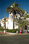 Group of people walking on a street corner, Old Town San Diego California, USA