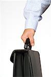 Close-up of a businessman holding a briefcase