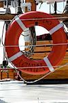 Close-up of an orange life belt on a yacht