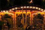 Carousel in an amusement park at night, San Diego, California, USA