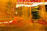 Lights on a carousel in an amusement park at night, San Diego, California, USA