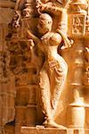 Statue carved on the wall of a temple, Jaisalmer, Rajasthan, India