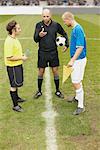 Referee tossing a coin