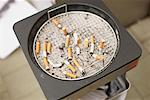 Cigarette butts in bin