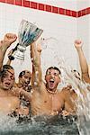 Winning football team in the bath