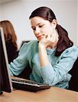 Girl sitting at computer