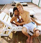 Couple Sitting on Chair