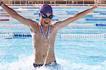 Boy Cheering in Swimming Pool