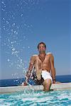 Man Drinking from Thermos on Beach - Stock Photo - Masterfile -  Rights-Managed, Artist: Masterfile, Code: 700-00606349