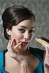 Woman Eating Eclair