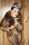 Woman Posing With Fur Coat And Tiara