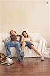 Couple on Sofa in New Home