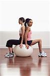 Women Sitting on Exercise Ball