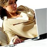 Close-up of a businesswoman working on a laptop