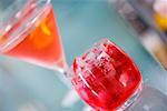 Close-up of a glass of martini and a glass of red wine