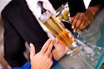 Close-up of a businessman seated at a bar counter