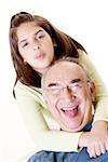 Portrait of a granddaughter hugging her grandfather