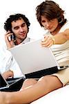 Young couple looking at a laptop