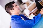 Side profile of a mid adult man at a bar counter