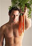 Man Holding Carrots