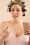 Woman with Granola Bar and Chocolate Bar