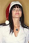 Portrait of Woman Wearing Santa Hat