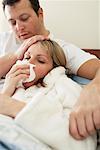 Husband Comforting Sick Wife