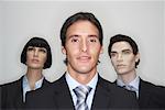 Businessman with Mannequins