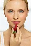 Woman Eating Strawberry