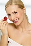 Portrait of Woman Holding Strawberry