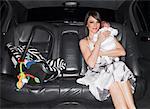 Mother With Baby In A Limo