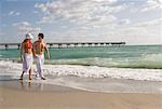 Couple Walking on Beach