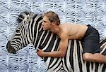 Man with Zebra