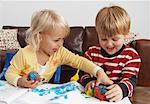Children Playing With Plasticine