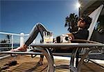 Man Sitting on Patio Chair