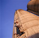 Man Climbing Silo