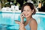 Close-up of a young woman talking on a mobile phone