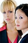 Portrait of two businesswomen looking serious