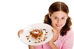 High angle view of a girl holding dessert in a plate