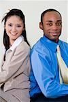 Portrait of a businesswoman and a businessman smiling