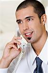 Close-up of a businessman talking on the telephone