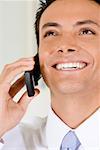 Close-up of a businessman talking on a mobile phone