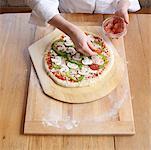 Woman Making Pizza