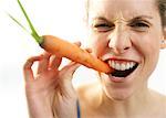 Woman Biting Carrot