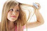 Girl Brushing Hair