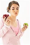 Girl Holding Apples